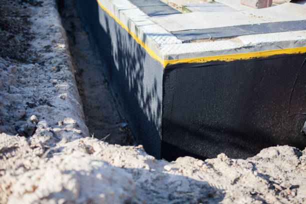 Professional Exterior Waterproofing technician working in Milton, KY